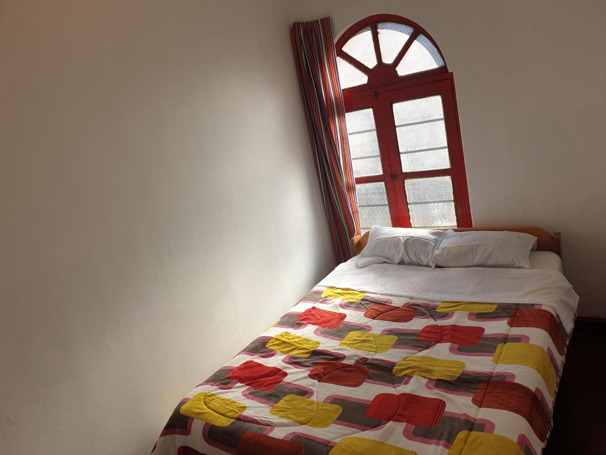 Sk Hostal Cusco Quarto foto